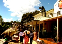 Family walks into the Dinosaur Museum, Canberra