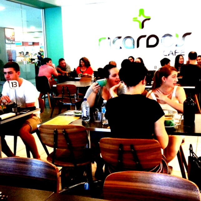 People sitting inside Ricardo's Cafe