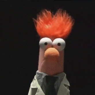 Beaker from The Muppets is shaking his head in panic