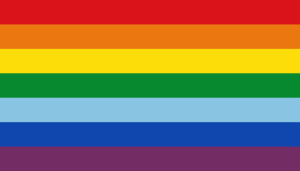 The Cusco flag has seven coloured stripes: red, orange, yellow, green, blue, blue, and purple